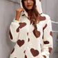 Relaxed-fit brown jumpsuit with cute heart pattern and hood
