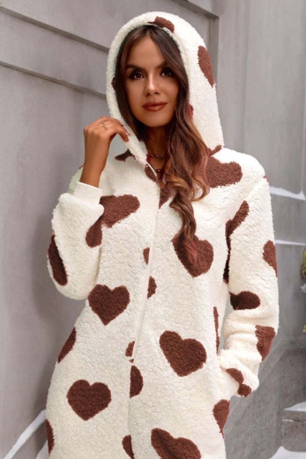 Relaxed-fit brown jumpsuit with cute heart pattern and hood
