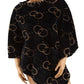 luxurious black poncho with classic pattern
