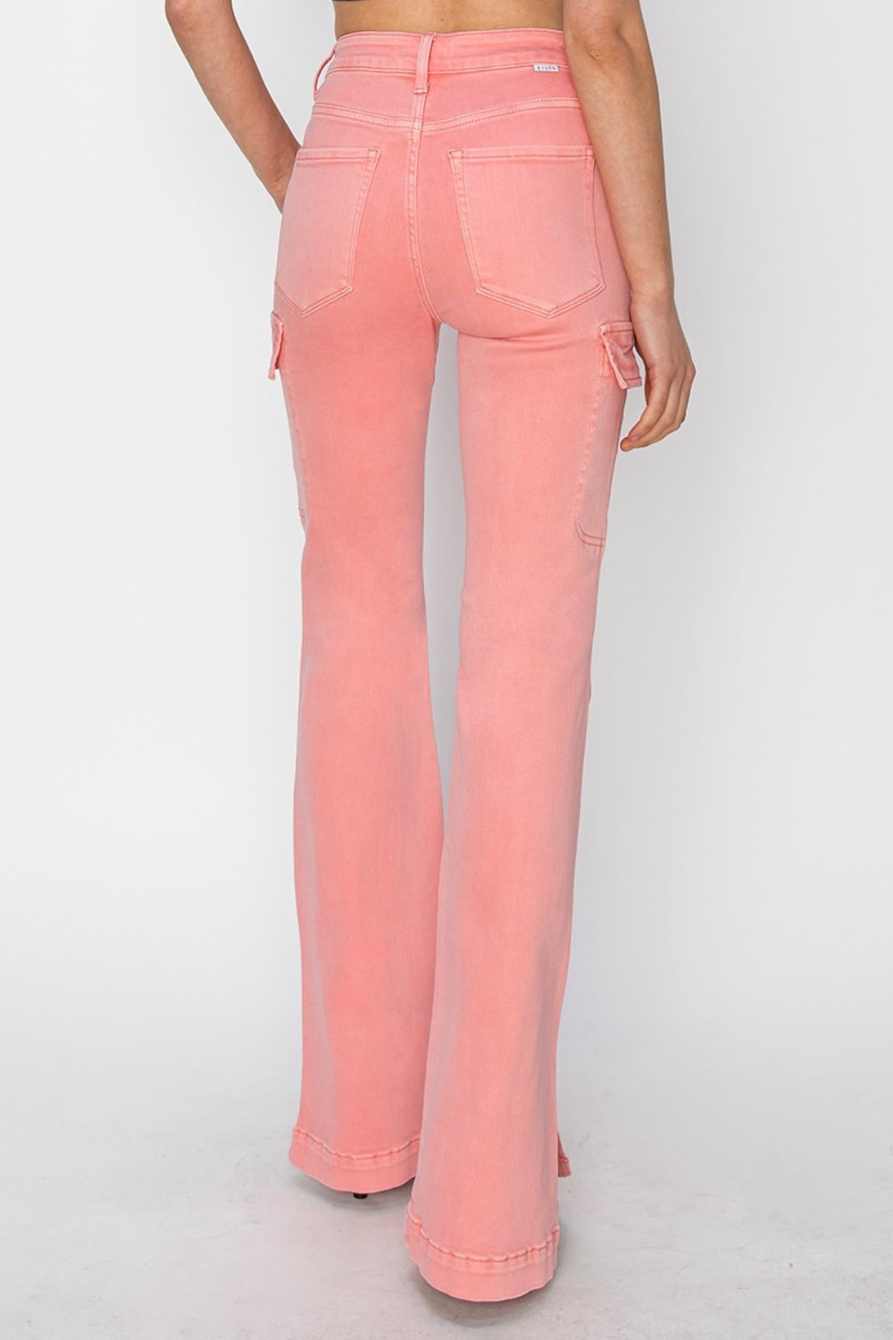 Pink cargo bootcut jeans from RISEN, featuring a high-rise fit