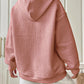 textured pink hoodie with drawstring hood
