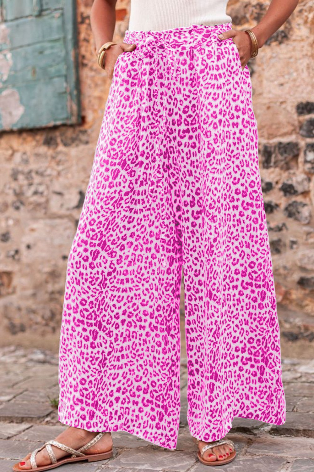 Pink leopard wide leg pants with relaxed fit and drawstring closure