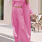 Pink women's pant suit set with a sleeveless top and comfortable wide-leg pants
