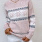 Pink snowflake knit sweater with ribbed cuffs and hem, offering a soft, warm fit for winter.

