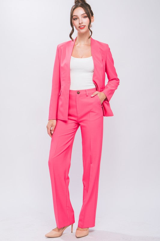 Pink formal blazer pants with functional belt loops for styling.
