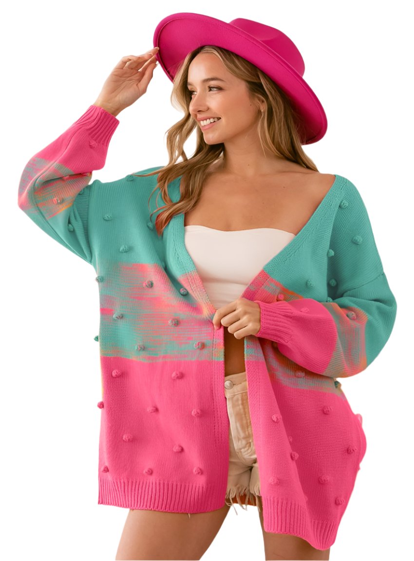 Pink and teal cardigan with fun pompom accents and open front
