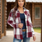 Burgundy plaid shirt showing functional chest pockets and soft fabric.
