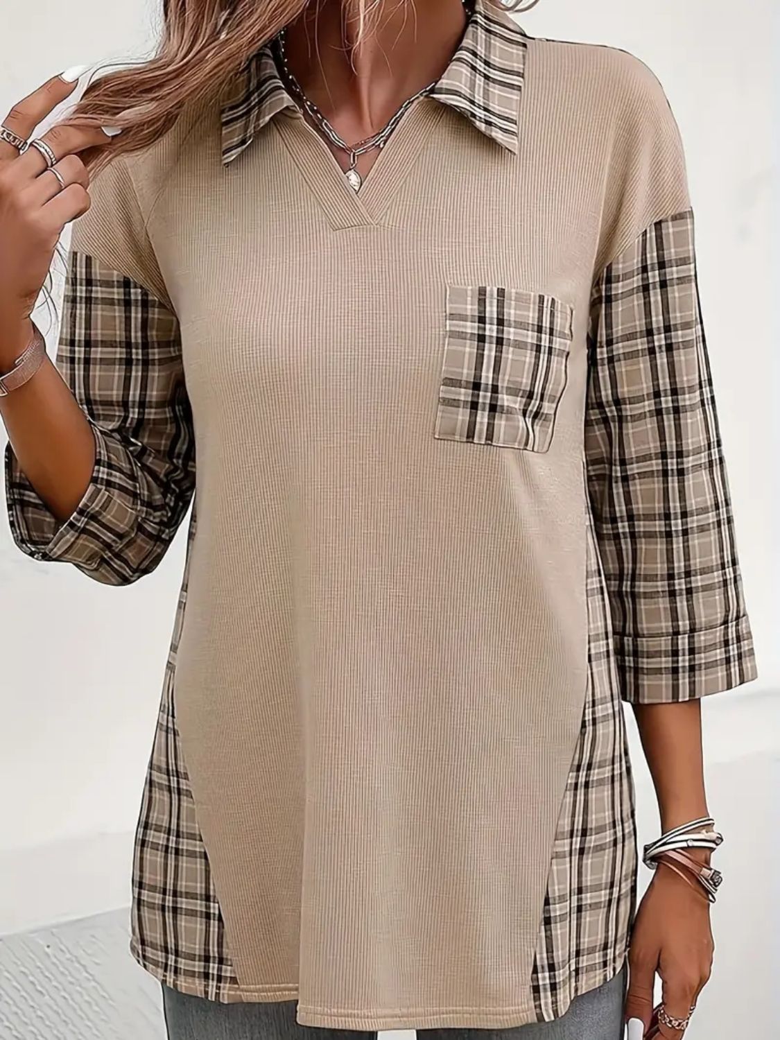 Stylish plaid blouse for women with a front pocket detail
