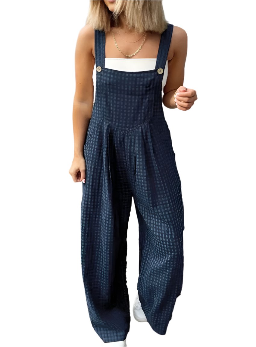 Front view of Plaid Wide Strap Wide Leg Overalls styled with a white tank top.
