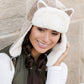 Playful kitten ear hat with cozy lining
