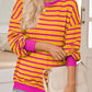 Soft and slightly stretchy orange striped pullover perfect for casual days.
