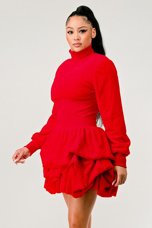 Playful red dress with long sleeves and a ruffled skirt, ideal for various occasions.
