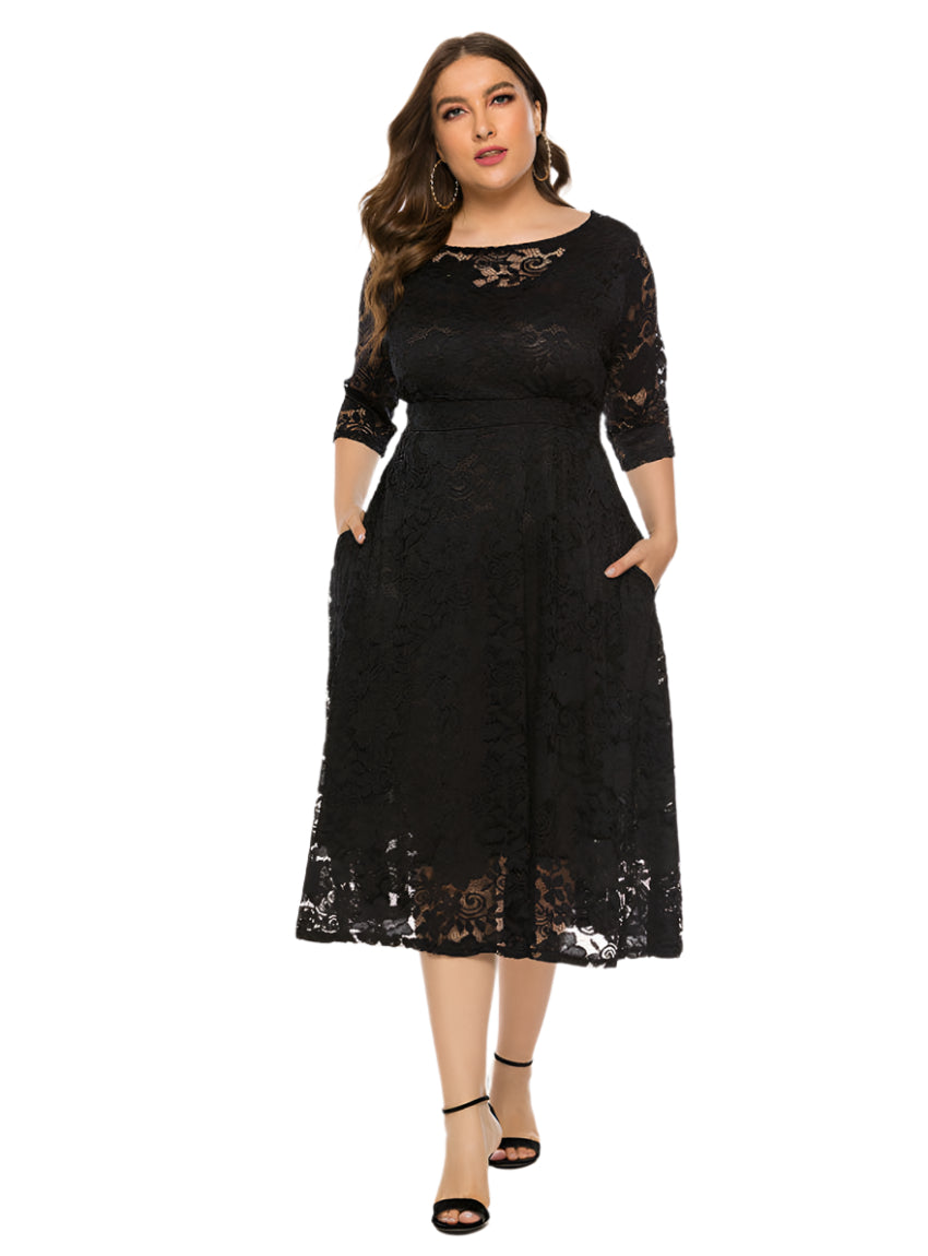 Front view of plus-size black lace midi dress with round neckline and 3/4 sleeves.
