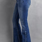 Trendy washed flare jeans with stitching details for plus size women.
