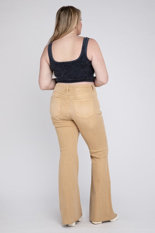 Full-length tan denim jeans with a relaxed fit and distressed accents.
