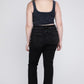 Back view of black plus-size crop flare jeans featuring a trendy frayed hem.
