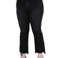 Front view of plus-size high-rise crop flare jeans in black denim with frayed hem.
