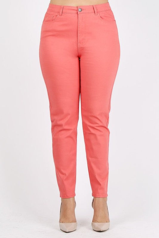 Coral-colored plus-size stretchy jeans with a vibrant finish.
