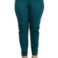 Front view of Plus Size High Waist Teal Stretch Jeans styled with black heels.
