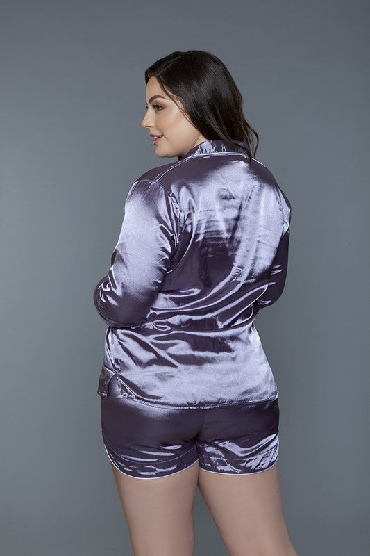 Plus size lilac satin pajama shorts with an elastic waistband and drawstring for a custom fit.
