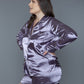 Comfortable plus-size satin pajama set in lilac with luxurious details.





