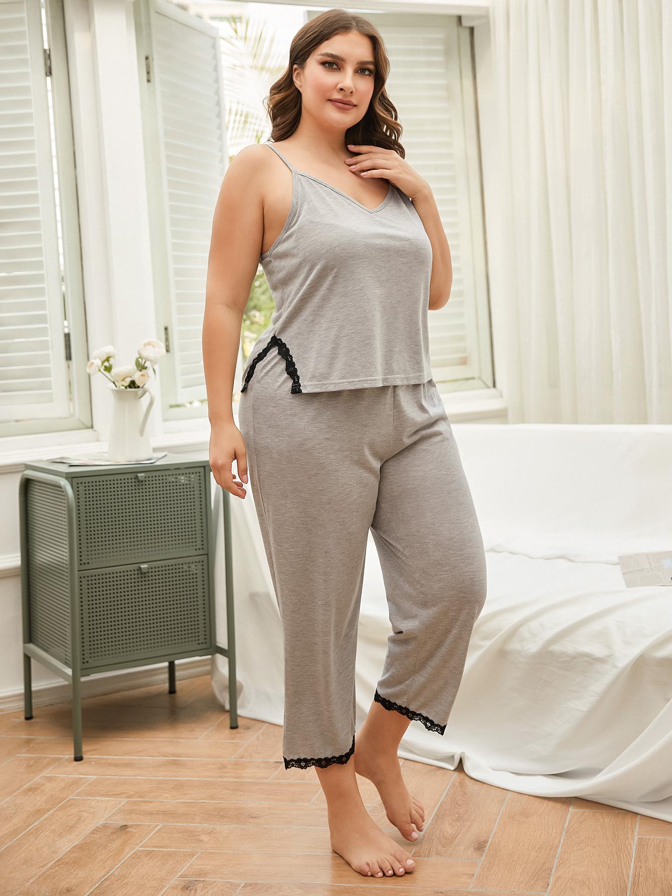 Gray plus-size pajama set with black lace accents, sleeveless top and cropped pants.
