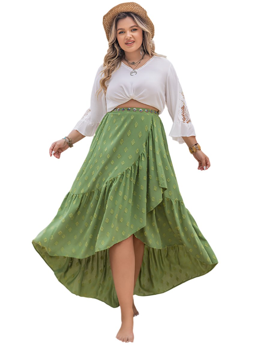 Woman wearing a flowy green plus size midi skirt with a high-low hemline
