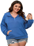 Woman wearing a plus size blue quarter zip hoodie
