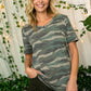 Camouflage print V-neck top for women in plus size, offering a comfortable and laid-back style.
