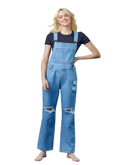 Front view of Pocket Patched Ripped Denim Overalls in medium wash with distressed legs.
