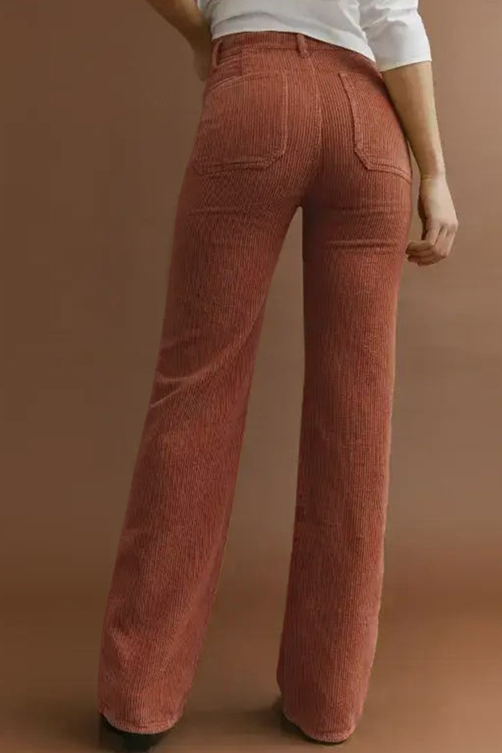 Brown textured high-waist straight-leg pants with functional pockets.