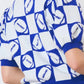 Trendy puff sleeve football sweater in royal blue and white checkerboard print.