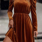 Velvet party dress in rich mocha color with high-waisted silhouette
