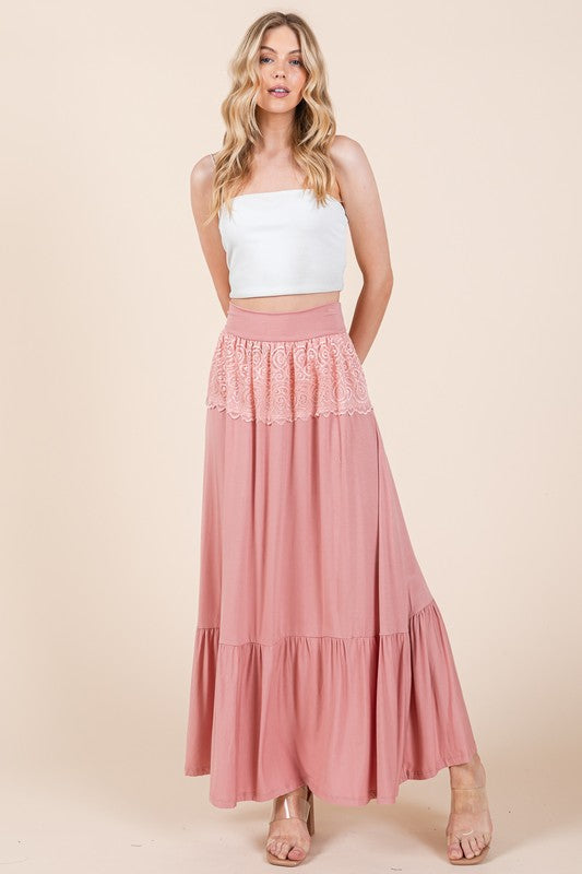 Flowing boho maxi skirt with pull-on waistband and lace.
