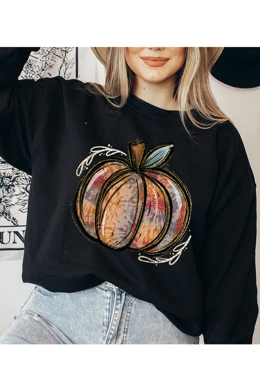 Black pumpkin graphic sweatshirt styled with jeans
