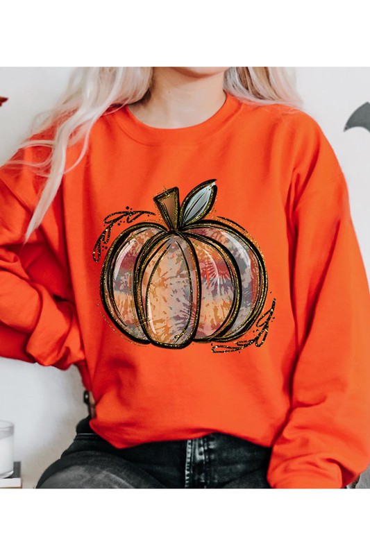 Orange pumpkin graphic sweatshirt styled for autumn
