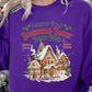 Fun purple holiday sweatshirt featuring North Pole Gingerbread Bakery graphic.