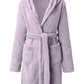 Purple hooded robe with a plush, soft texture for ultimate warmth.
