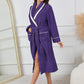 Soft purple robe with elegant contrast trim and a relaxed fit.
