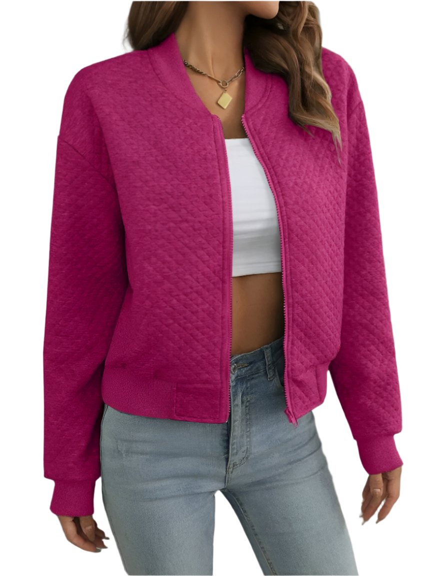 Front view of pink quilted bomber jacket, a soft, feminine touch to any outfit.
