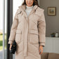 Front view of khaki quilted hooded puffer coat with pockets
