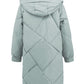 Back view of sage green hooded puffer coat for women
