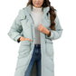 Front view of sage quilted hooded puffer coat with pockets
