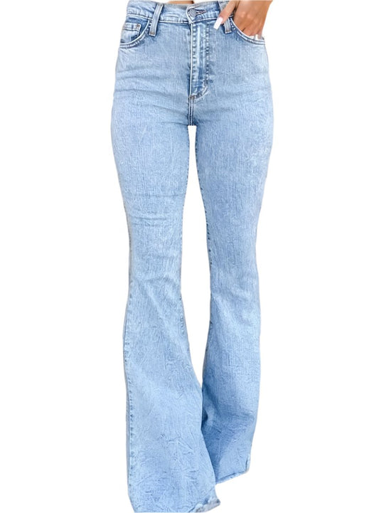 Front view of raw hem high waist bootcut jeans in light wash.
