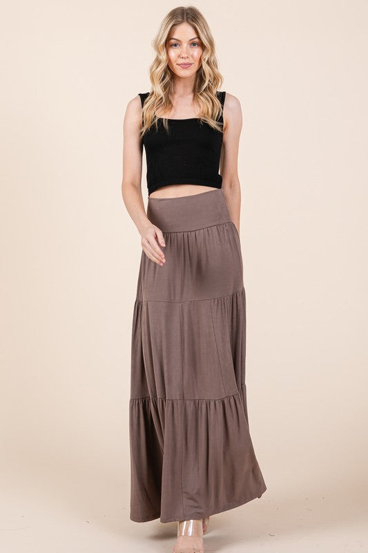 Soft rayon maxi skirt with tiered design in brown.
