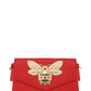 Vibrant red crossbody bag with intricate bee embellishment for added charm.
