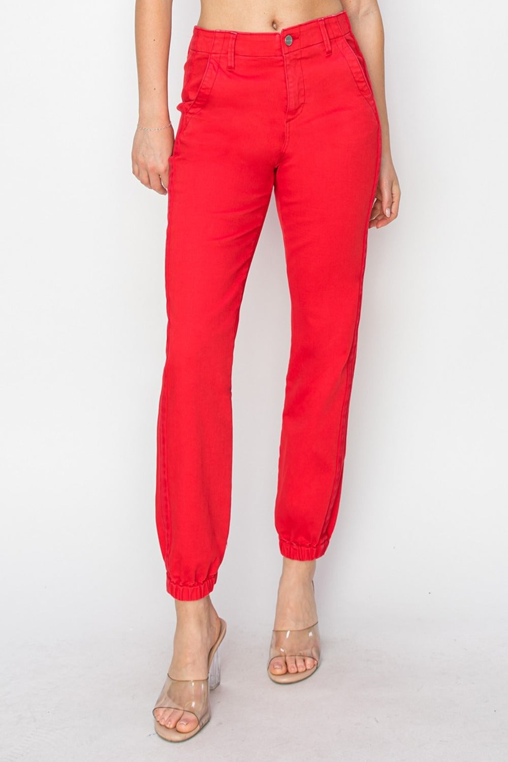 Women's red high-waisted jogger jeans with soft, slightly stretchy fabric for comfort.
