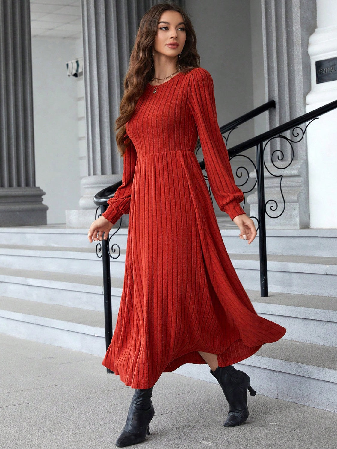 side view of red maxi dress with long sleeves
