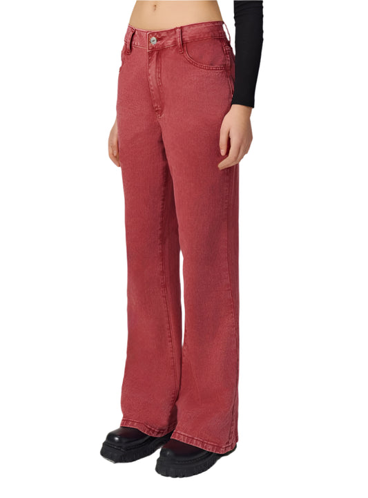 Side view of red vintage bootcut jeans emphasizing flattering silhouette and durability.
