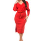 Model wearing a red wrap sweater dress with a v-neckline and belted waist, front view.
